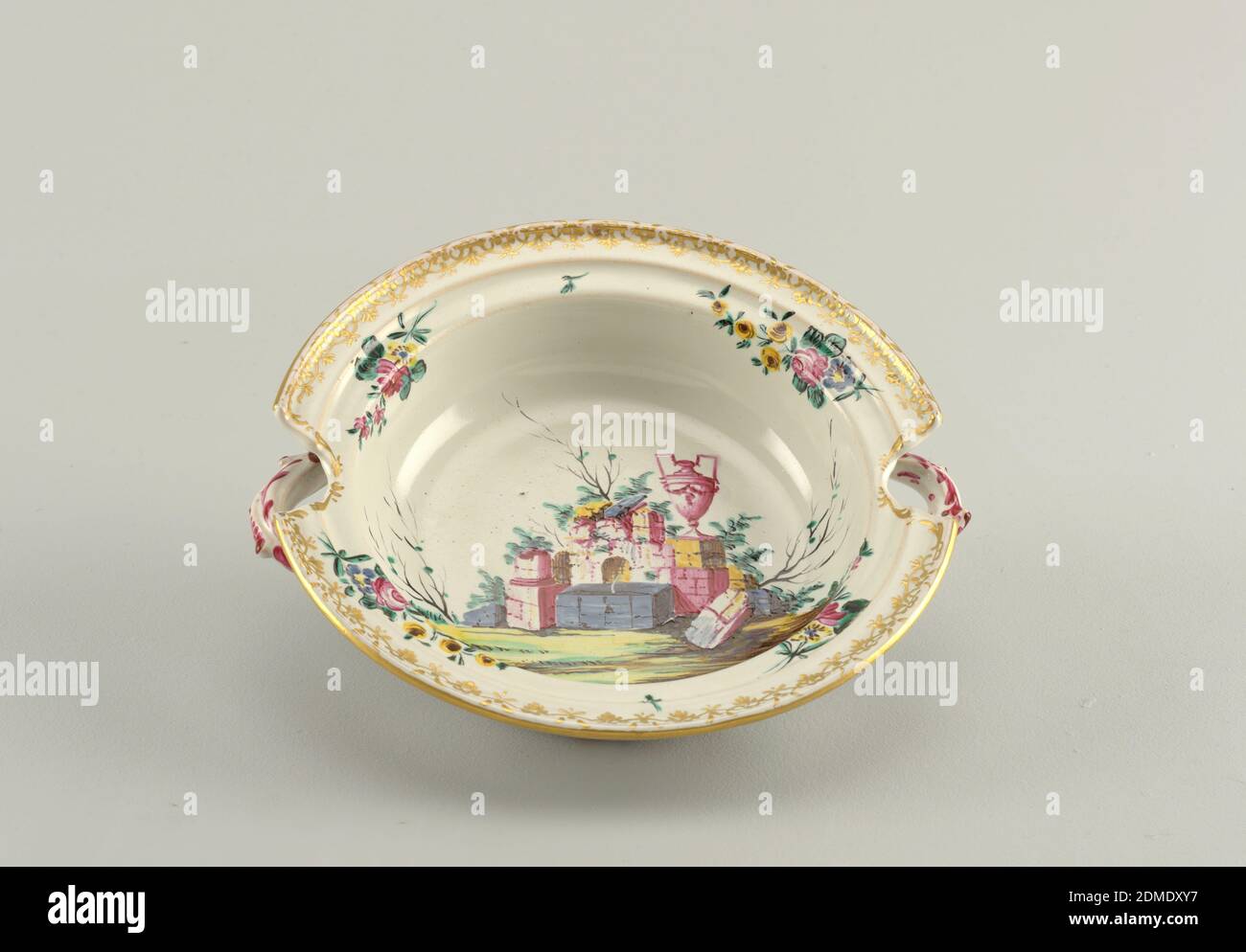Dish, Gilded tin-glazed earthenware, Floral bouquets and gilding at rim. At center, ruins in a landscape. Cut-outs above molded handles., Italy, ca. 1770, ceramics, Decorative Arts, Dish Stock Photo