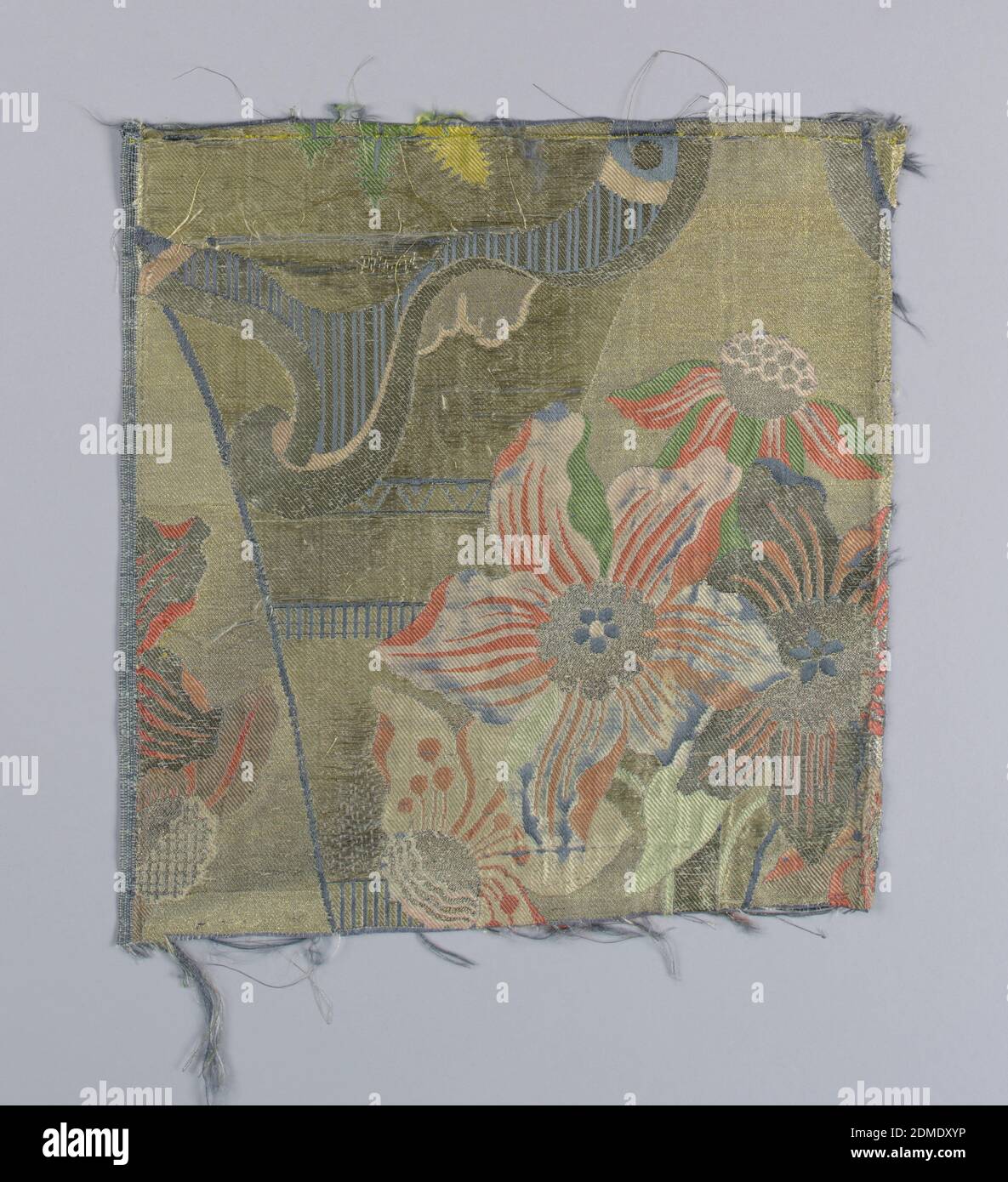 Textile, Medium: silk, metallic threads Technique: 8-harness satin with discontinuous supplementary weft patterning (brocade) bound in 1/3 twill, A large pot or bulb with a tall sprouting stem with four amarylis-like flowers; from the same pot a hanging plant descends, resembling a date palm. Of a second motif, only the bottom of a conical vase form is visible on A. The vertical repeat is completed in fragment B. In light blue, green, orange, yellow, and off-white silks on a metallic gold ground., Europe, 1705–07, woven textiles, Textile Stock Photo