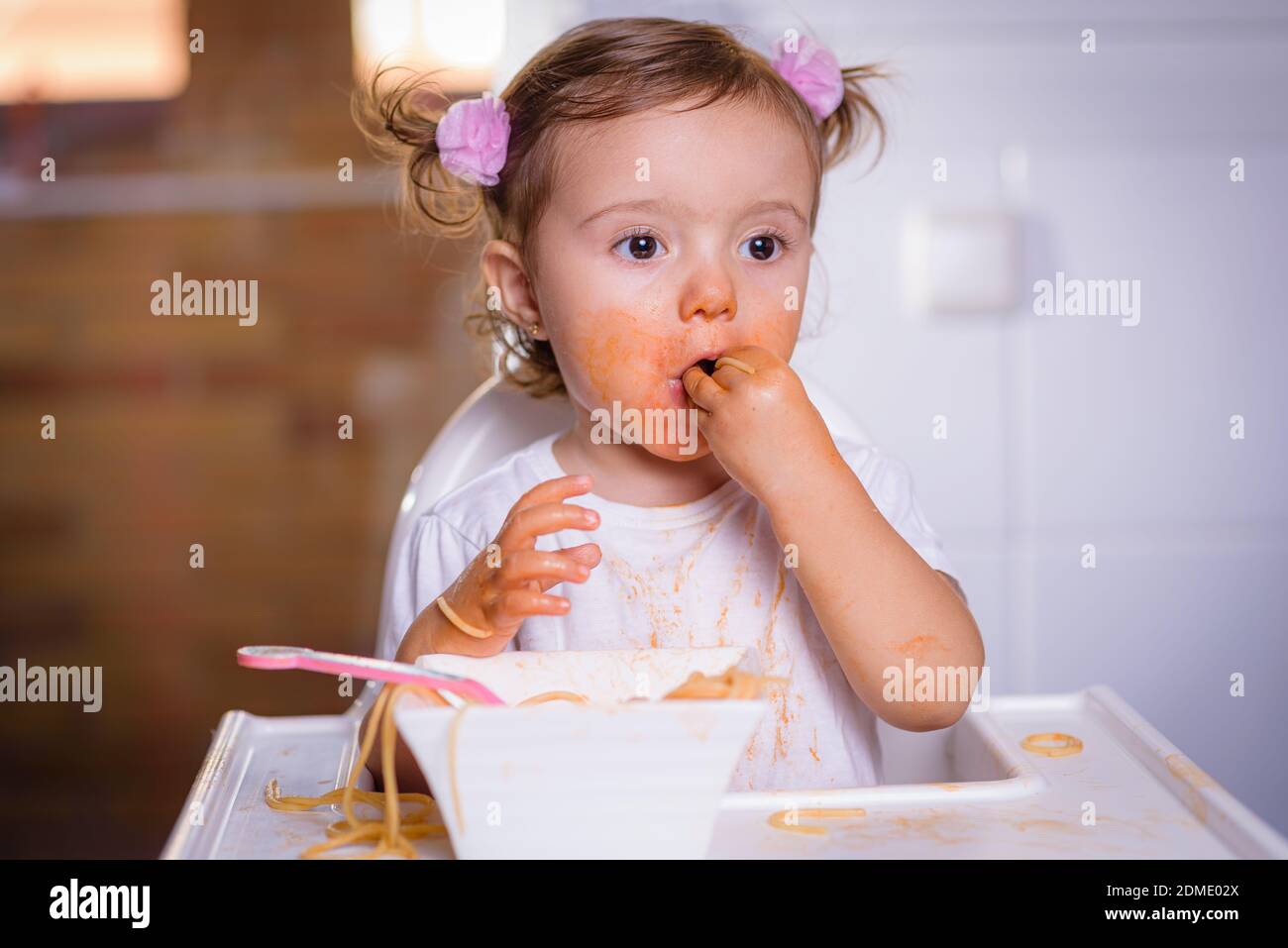 Baby pasta high chair hires stock photography and images Alamy