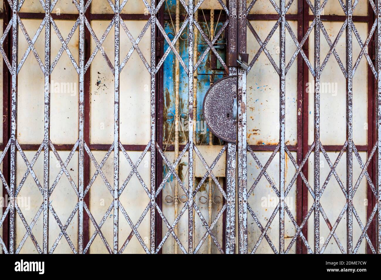 January 10, 2020 -  Alor Setar, Kedah, Malaysia: Close up detail of an old folding shutter gate in the front of a Perenakan shophouse in the city of A Stock Photo