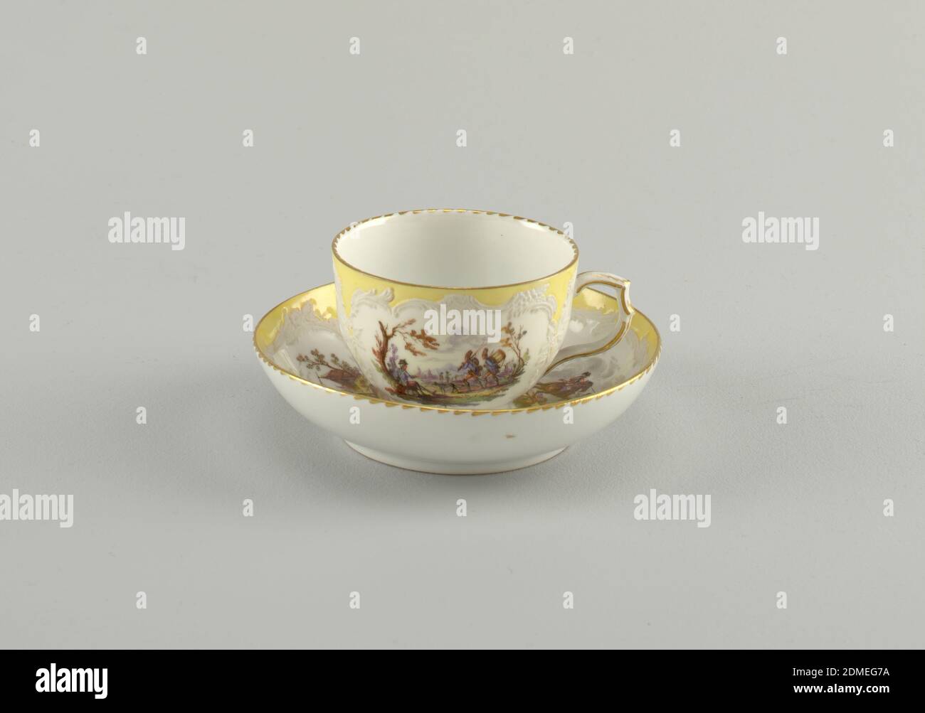 Cup and Saucer with Battle Scenes (Bataillen-Malerei), Royal Porcelain Manufactory, Berlin, German, established 1763, hard paste porcelain, vitreous enamel, gold, Curving cup. Slightly compressed in lower part. Scrolling handle. Saucer slightly curved. Decoration similar to that of 1953-17-48. Neuzierat style., Germany, 1870–1900, ceramics, Decorative Arts, cup and saucer, cup and saucer Stock Photo