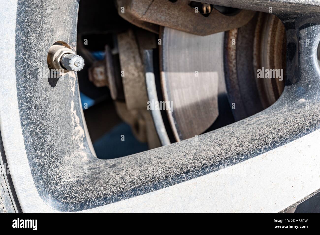 performing maintenance check on a vehicle tire by checking pressure