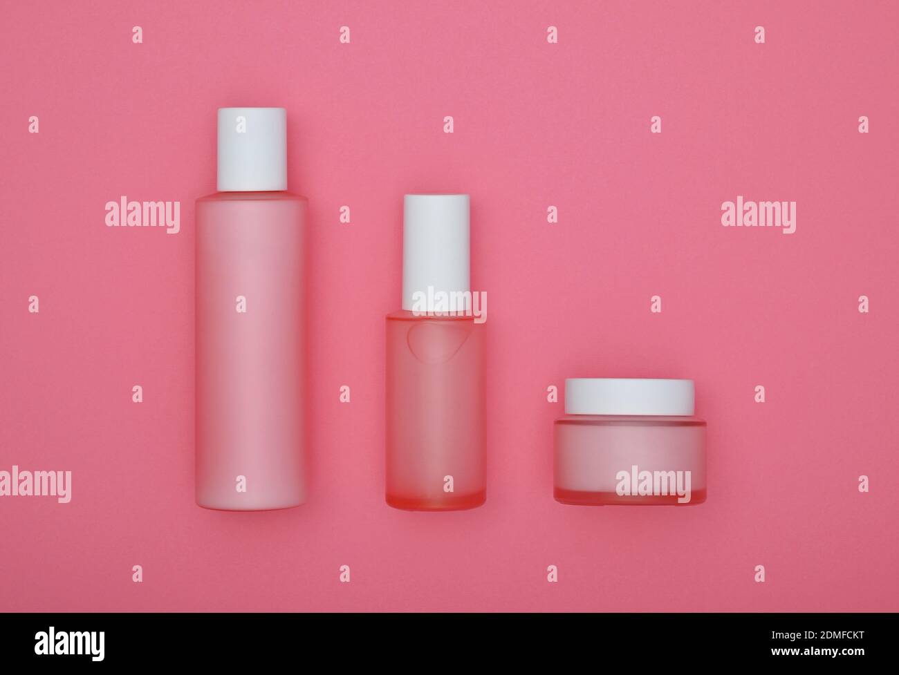 Directly Above Shot Of Beauty Products On Pink Background Stock Photo
