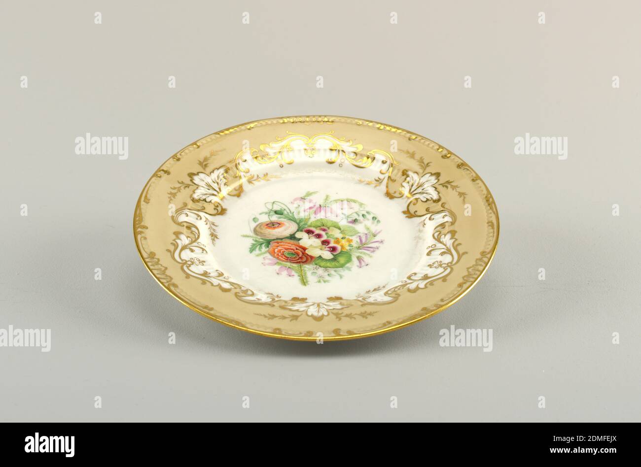 Plate, hard paste porcelain, vitreous enamel, gold, Flat marli and smooth rim. At center, white ground with overglaze florals. Surrounding this, a beige grown with gilt scrollwork., England, 1825–1842, ceramics, Decorative Arts, plate, plate Stock Photo