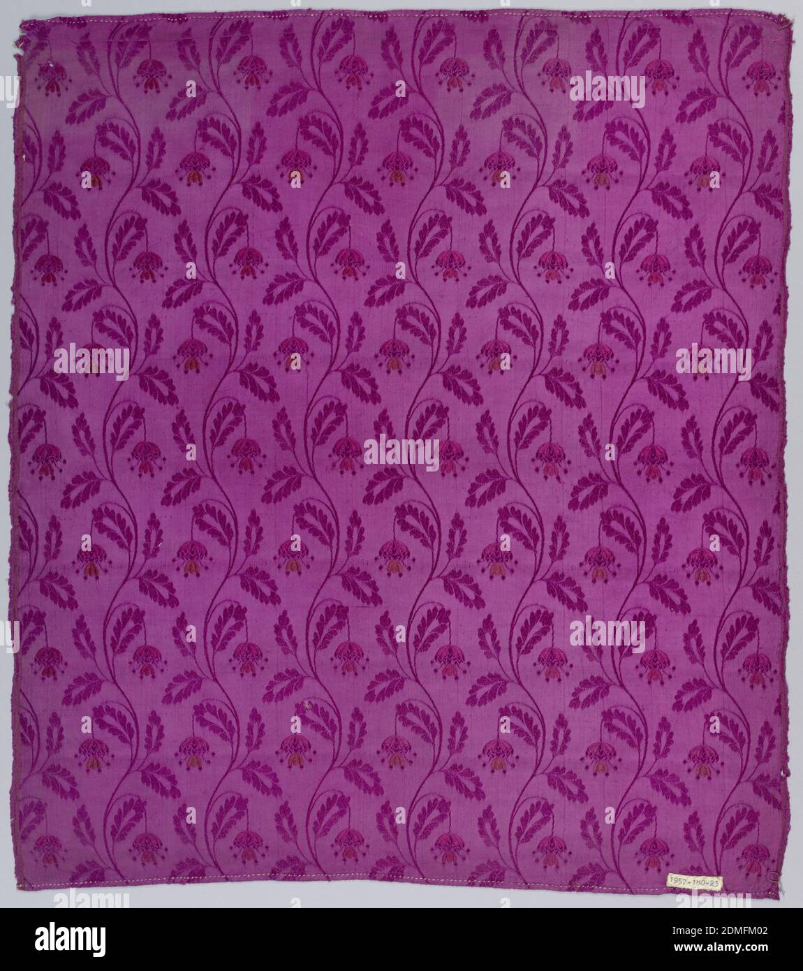 Textile, Medium: silk Technique: plain compound weave, Bright magenta dress silk with a meandering vertical floral design. Dark brown and dark red leaves of small flowers brocaded in lancé technique., France, 19th century, woven textiles, Textile Stock Photo