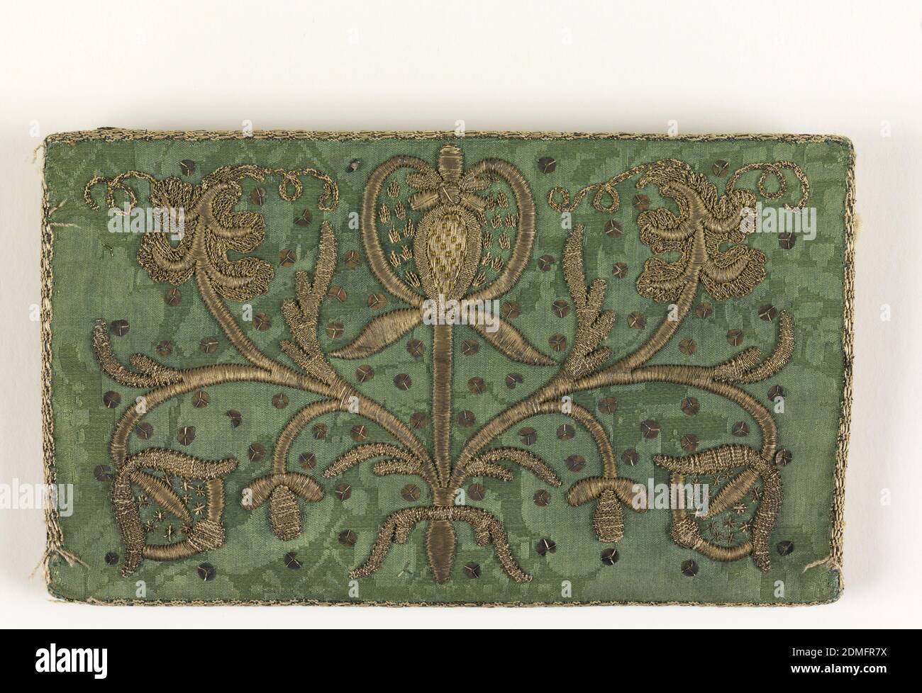 Letter case, Medium: metal-wrapped silk threads, flat gilt wire and silver spangles on silk foundation Technique: embroidered in padded couching stitches on damask foundation, Letter case of green silk damask with conventionalized design in metallic thread; lining of white silk., Italy or Spain, 17th century, costume & accessories, Letter case Stock Photo