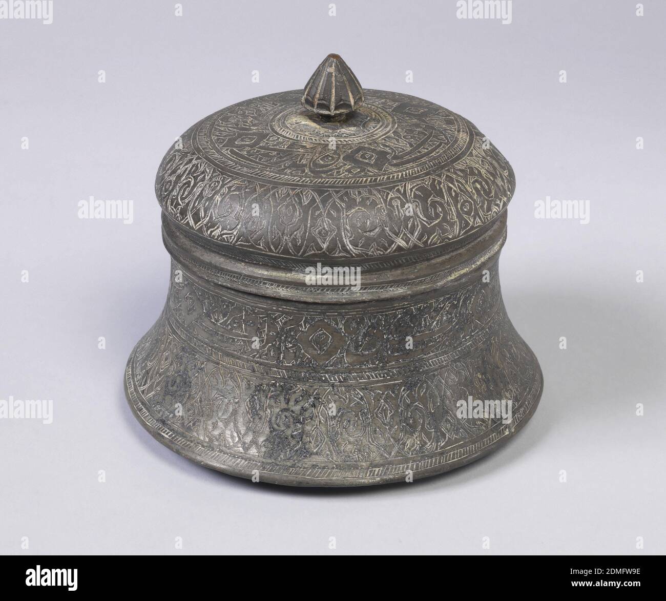 https://c8.alamy.com/comp/2DMFW9E/lidded-bowl-tinned-and-engraved-copper-bowl-with-lid-campaniform-lid-surmounted-by-a-paneled-pointed-mushroom-shaped-knob-body-and-cover-decorated-with-wide-engraved-bands-of-inscription-bounded-by-narrower-bandings-of-diagonal-lines-19th-century-metalwork-decorative-arts-lidded-bowl-2DMFW9E.jpg