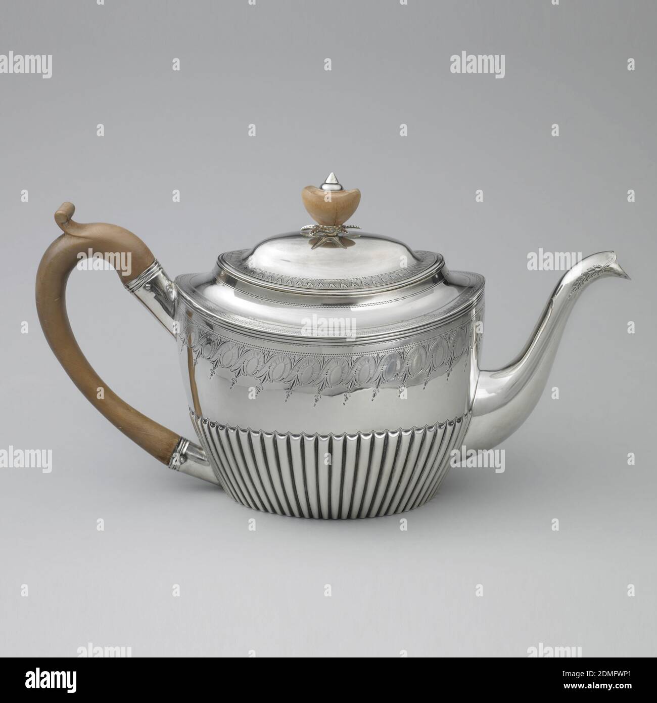 https://c8.alamy.com/comp/2DMFWP1/teapot-silver-wood-silver-teapot-engraved-with-a-foliate-and-spiral-patterned-band-at-the-shoulder-above-a-tapering-reeded-base-curved-spout-curved-wooden-handle-slightly-domed-lid-with-wooden-finial-of-smooth-acorn-shape-topped-with-silver-terminus-its-base-with-silver-leaf-form-surround-london-england-179899-metalwork-decorative-arts-teapot-teapot-2DMFWP1.jpg