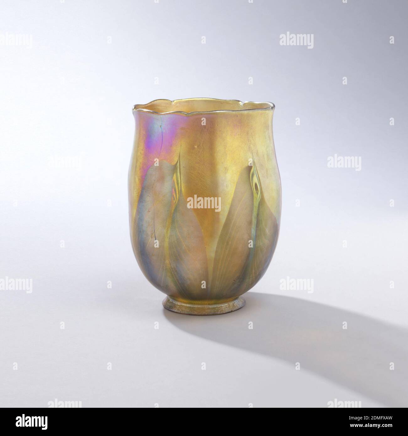 Glass Lamp Shade High Resolution Stock Photography And Images Alamy Shade is completed with tiffany gold iridescent. https www alamy com five lamp shades louis comfort tiffany american 18481933 favrile glass a flower bud form glass shade for sconce over all iridescent finish with green yellow orange tones predominating green veined pointed leaf forms rise from base out curving lip with five indentations giving lip slightly lobed outline b c d and e same basic shapes colors free forms of leaves varying slightly color variation most noticeable in c where color is darker usa 1907 glasswares decorative arts five lamp shades image391271185 html