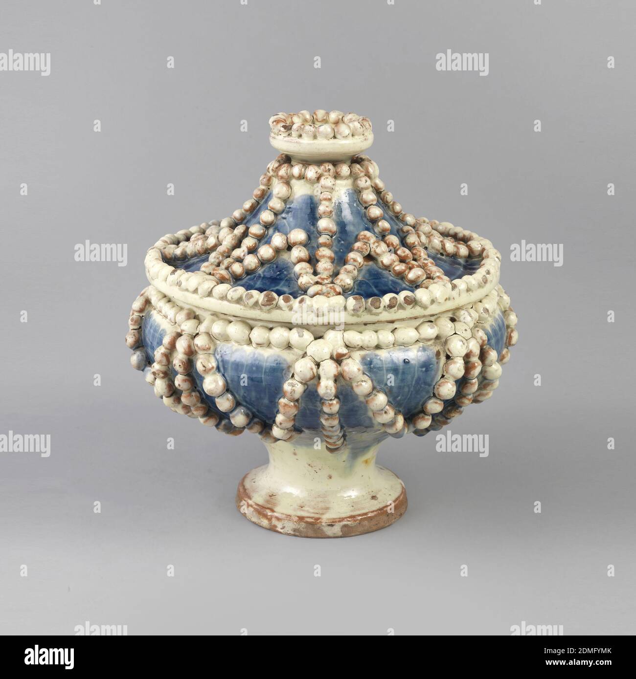 Bowl and lid, Earthenware, Blue footed bowl with star pattern of white pearls all over. Finial made up of crown of pearls., Switzerland, 18th century, ceramics, Decorative Arts, Bowl and lid Stock Photo