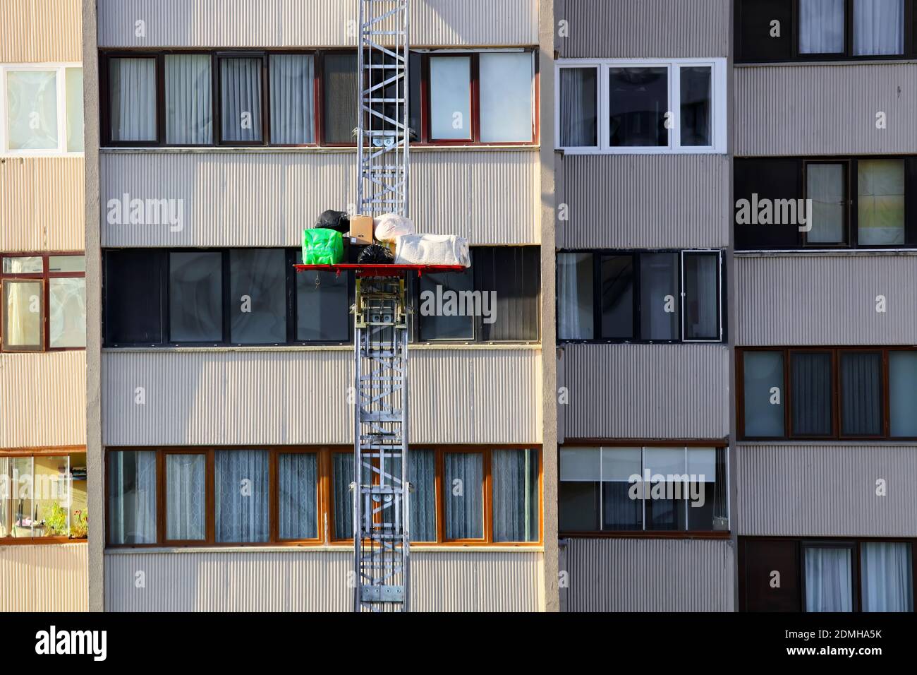 House removal with a hydraulic ladder or lift. Haulers delivering or