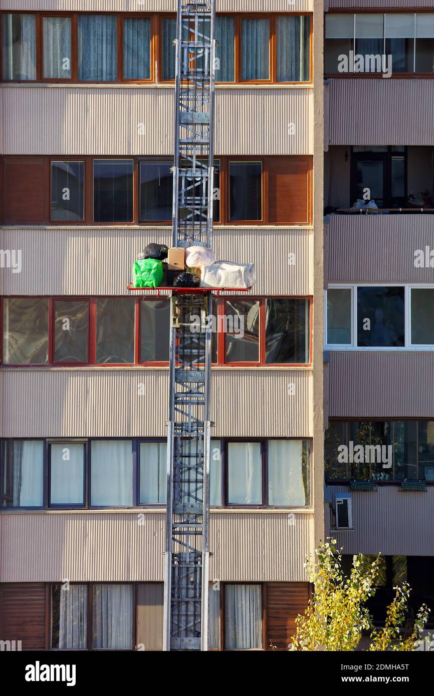 House removal with a hydraulic ladder or lift. Haulers delivering or