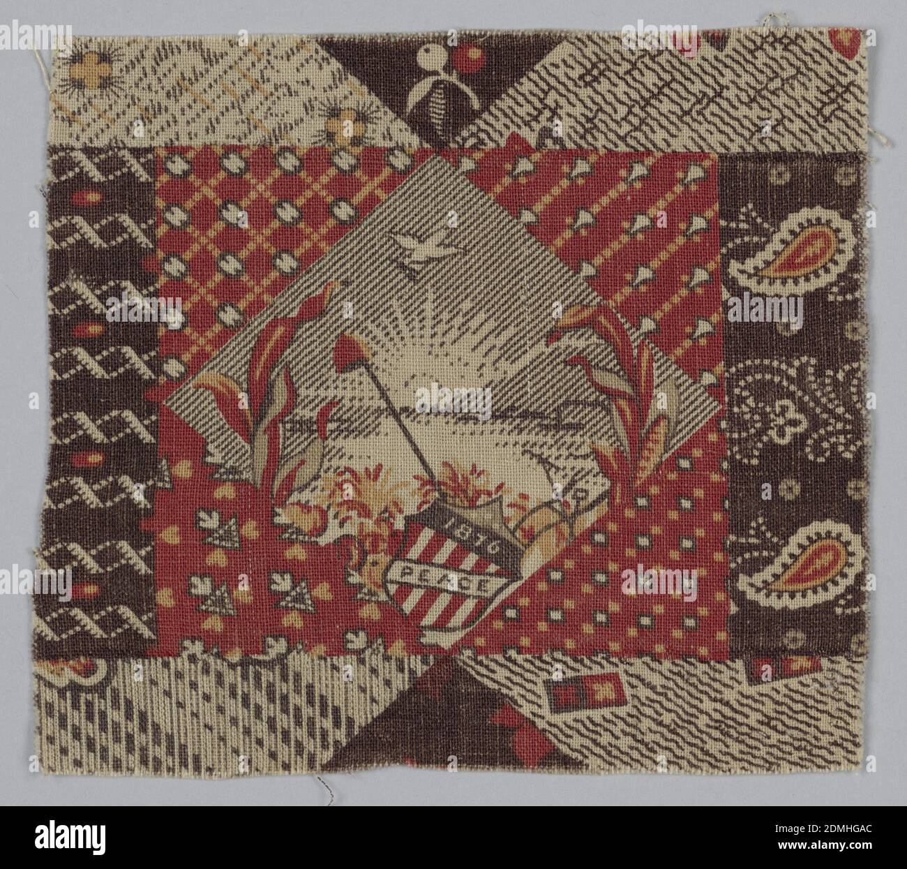 Fragment, Cocheco Print Works, (Dover, NH, USA), Medium: cotton Technique: printed, Small fragment of a centennial print in shades of brown, red and dark yellow. Diamond shape in center has a shield flag with '1876' and 'Peace.', USA, 1876, printed, dyed & painted textiles, Fragment Stock Photo