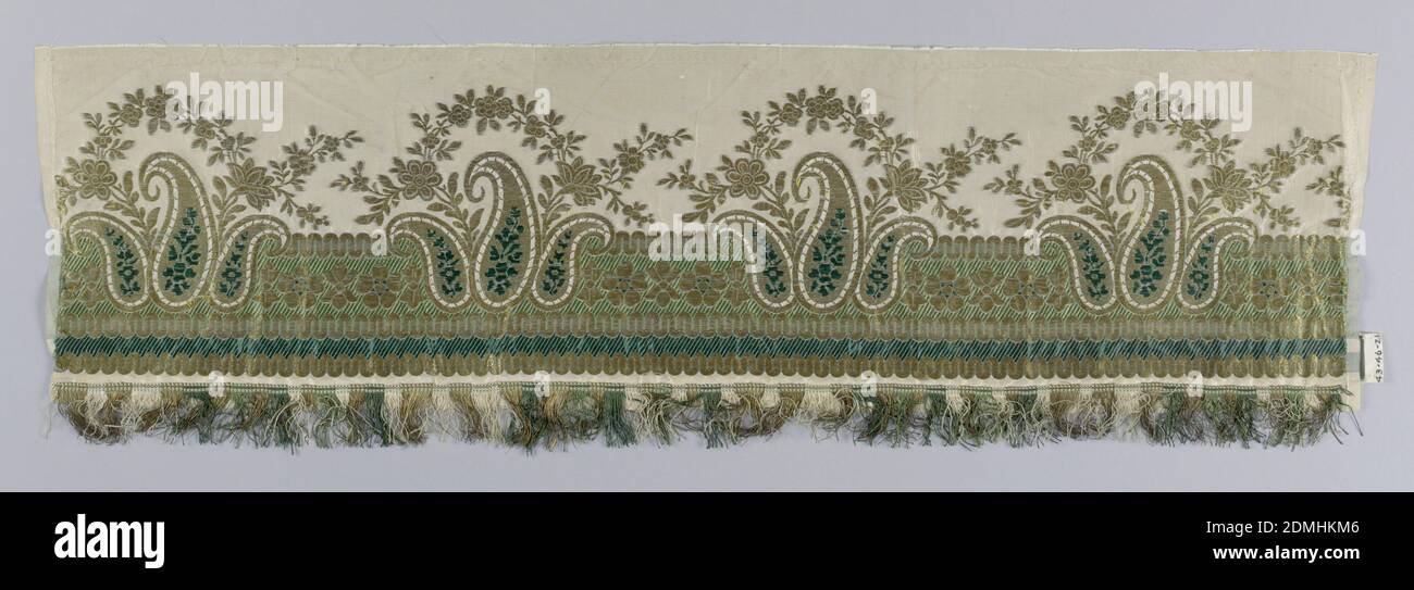 Textile, Medium: silk and metallic threads Technique: plain compound cloth, Woven border with horizontal bands of green and gold ornaments and groups of three Persian cones and flower garlands in two shades of green and gold thread on a white taffeta ground. Bordered with green, white, and gold fringe of the period., France, early 19th century, woven textiles, Textile Stock Photo