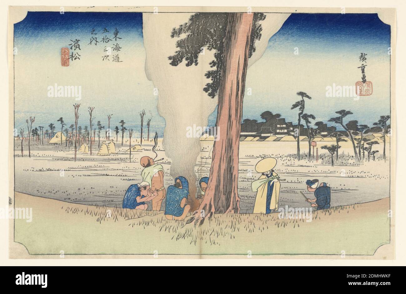 Hamamatsu, Wintertime, in The Fifty-Three Stations of the Tokaido Road (Tokaido Gojusan Tsugi-no Uchi), Ando Hiroshige, Japanese, 1797–1858, Woodblock print (ukiyo-e) on mulberry paper (washi), ink with color, Here is the subdued scene of farmers warming themselves by a fire under a giant cryptomeria tree overlooks the famous battlefield of Mikatagahara and castle of the first Tokugawa shogun, Ieyasu., Japan, ca. 1834, figures, Print Stock Photo