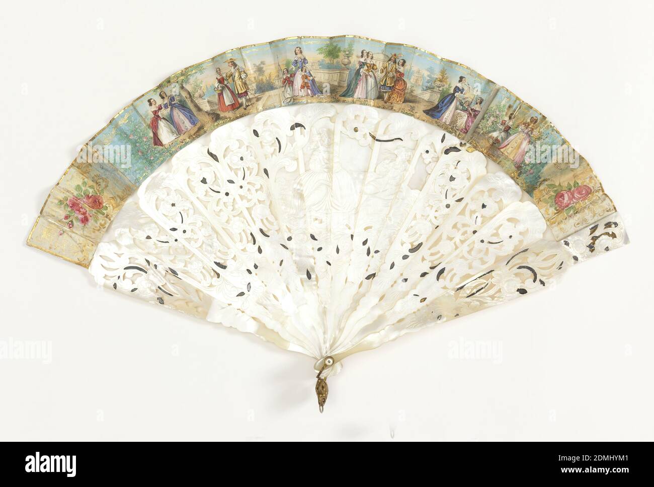 Pleated fan, Parchment leaf with gilded and hand-colored lithograph; carved and pierced mother-of-pearl sticks, Fan with carved and pierced mother-of-pearl sticks, and gilded leaf with lithograph promenade scene. On sticks: central cartouche of a lady and a gentleman playing the fife., ca. 1840, costume & accessories, Pleated fan Stock Photo