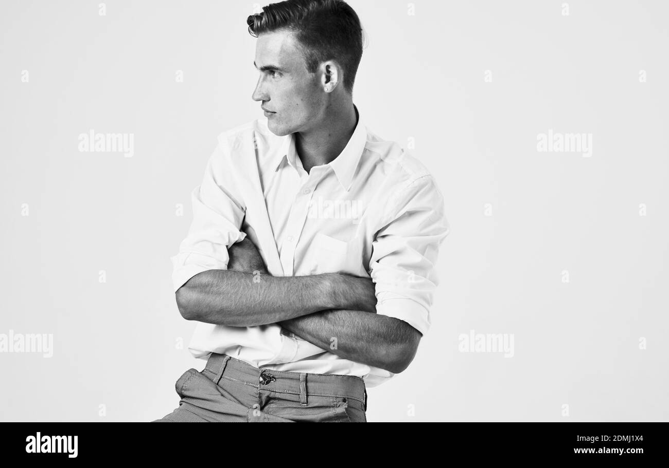 Black and white photograph of a handsome man gesturing with his hands ...
