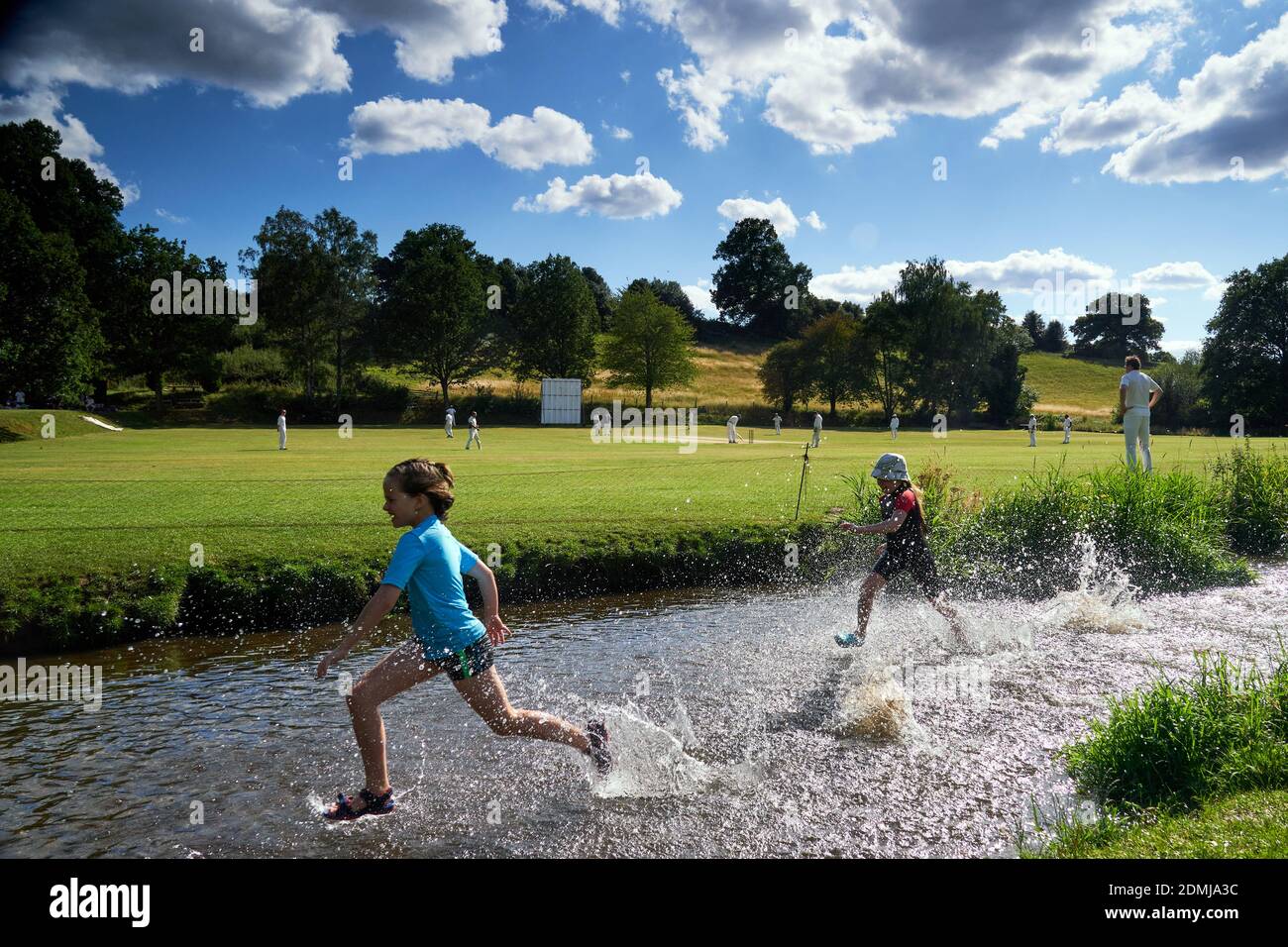 Here is the PA news agency’s selection of pictures of the year. Children play in the River Tillingbourne on the weekend recreational cricket was allowed to resume. The waterway forms a natural boundary at Abinger Cricket Club in Surrey. Worplesdon and Burpham were the visitors on a sunny day in July. Stock Photo