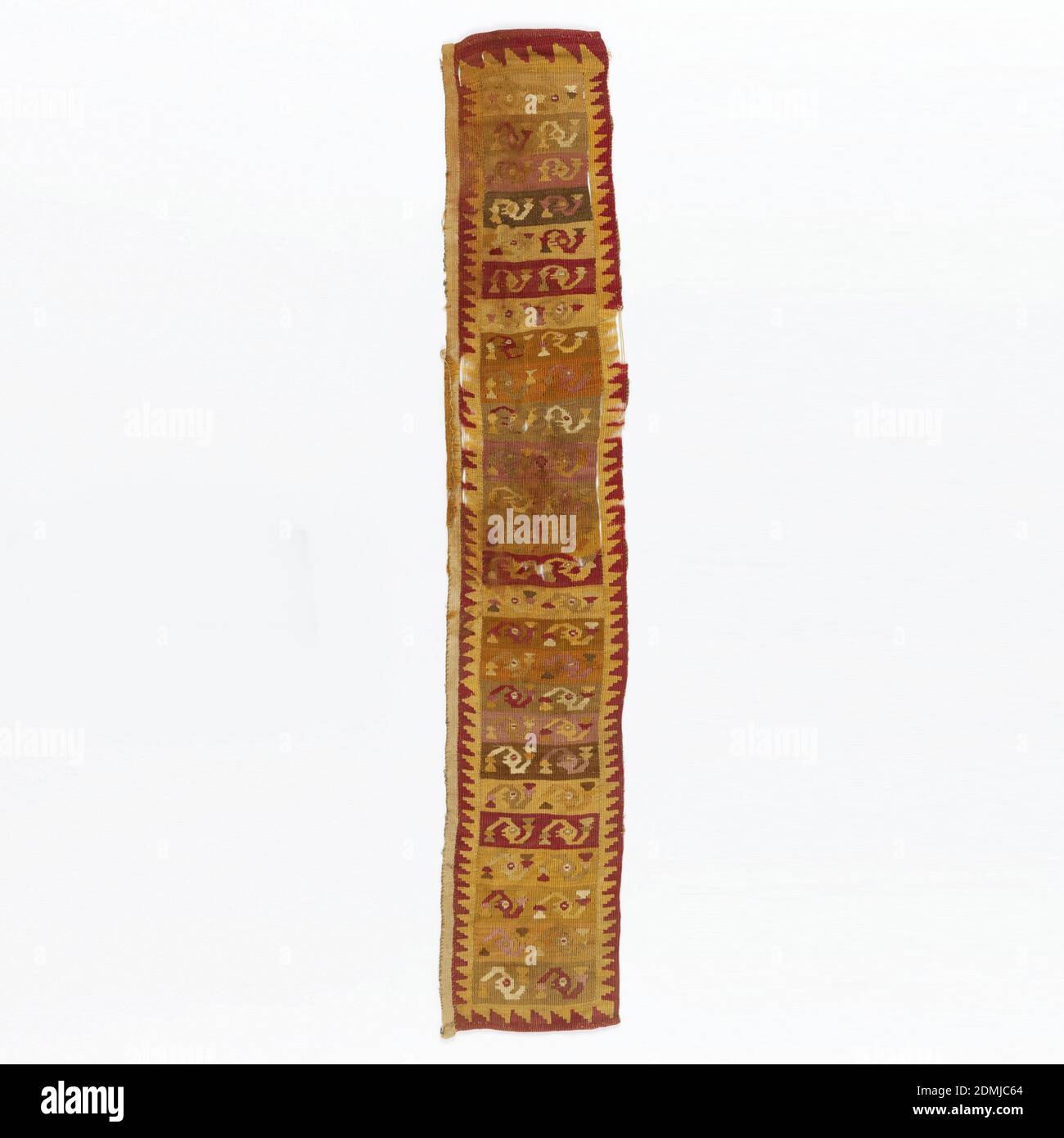 Textile, Medium: wool, cotton Technique: slit tapestry with wrapping; weft-faced plain weave; SLIT TAPESTRY: limited use of non-horizontal welts, sometimes between color areas only; two-faced; long slits are sewn together; SIDES: remains of attached fabric; ENDS: warp selvage on one end, turned udner and sewn down; other end cut, turned under, and sewn., Strip patterned by narrow bands containing bird heads (?) with tassels on backgrounds of varying colors including shades of red, pink, light brown, orange and yellow. A triangular stepped or toothed border on four sides Stock Photo