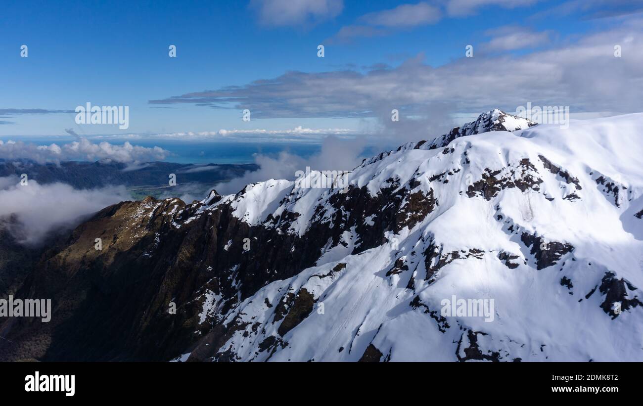 Snow Capped Mountains in New Zealand Stock Photo