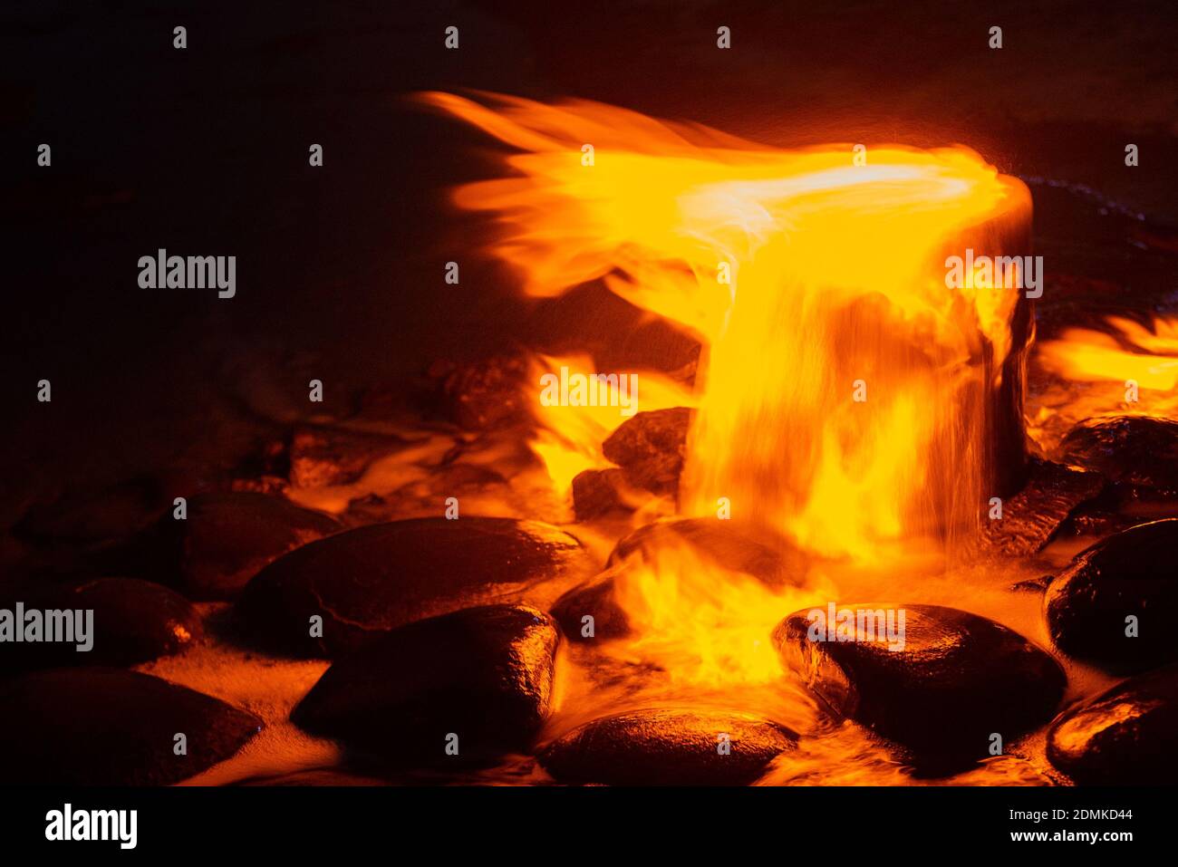 Spring of fire water. Burning methane in water. Cold fire Stock Photo