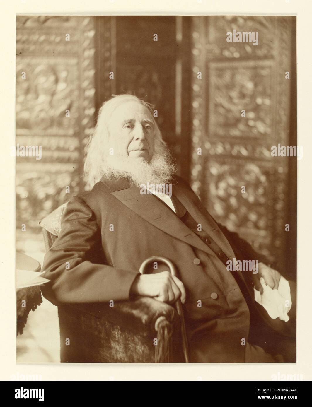 Portrait of Peter Cooper, Sepia photographic print on paper, A three-quarter length portrait of Peter Cooper, facing right. He is seated in an armchair, his cane held in his right hand., USA, ca. 1880, portraits, Photograph, Photograph Stock Photo