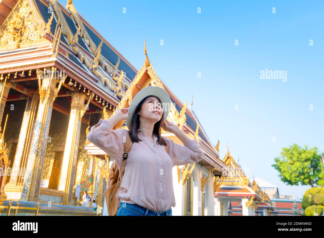 Beautiful asian tourist woman smile and enjoy travel on Vacation in Bangkok at Thailand Stock Photo