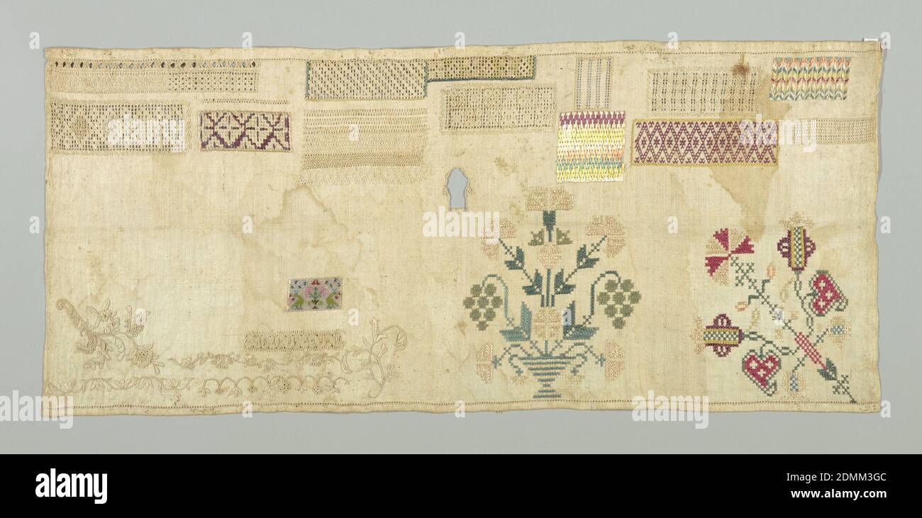 Sampler, Medium: silk, linen, and beads on canvas Technique: cross, stem, buttonhole, satin, long-armed cross, feather, chevron, and knots, embroidered on plain weave foundation; counted stitches, Several different patterns and motifs including vase of carnations and grapes, sprays of flowers, cornucopia of flowers, curving vines, and geometric patterns in colored silks and white cotton. At the lower right is a pattern of birds and trees in embroidery with beads, each sewn on independently., Mexico, 19th century, embroidery & stitching, Sampler Stock Photo