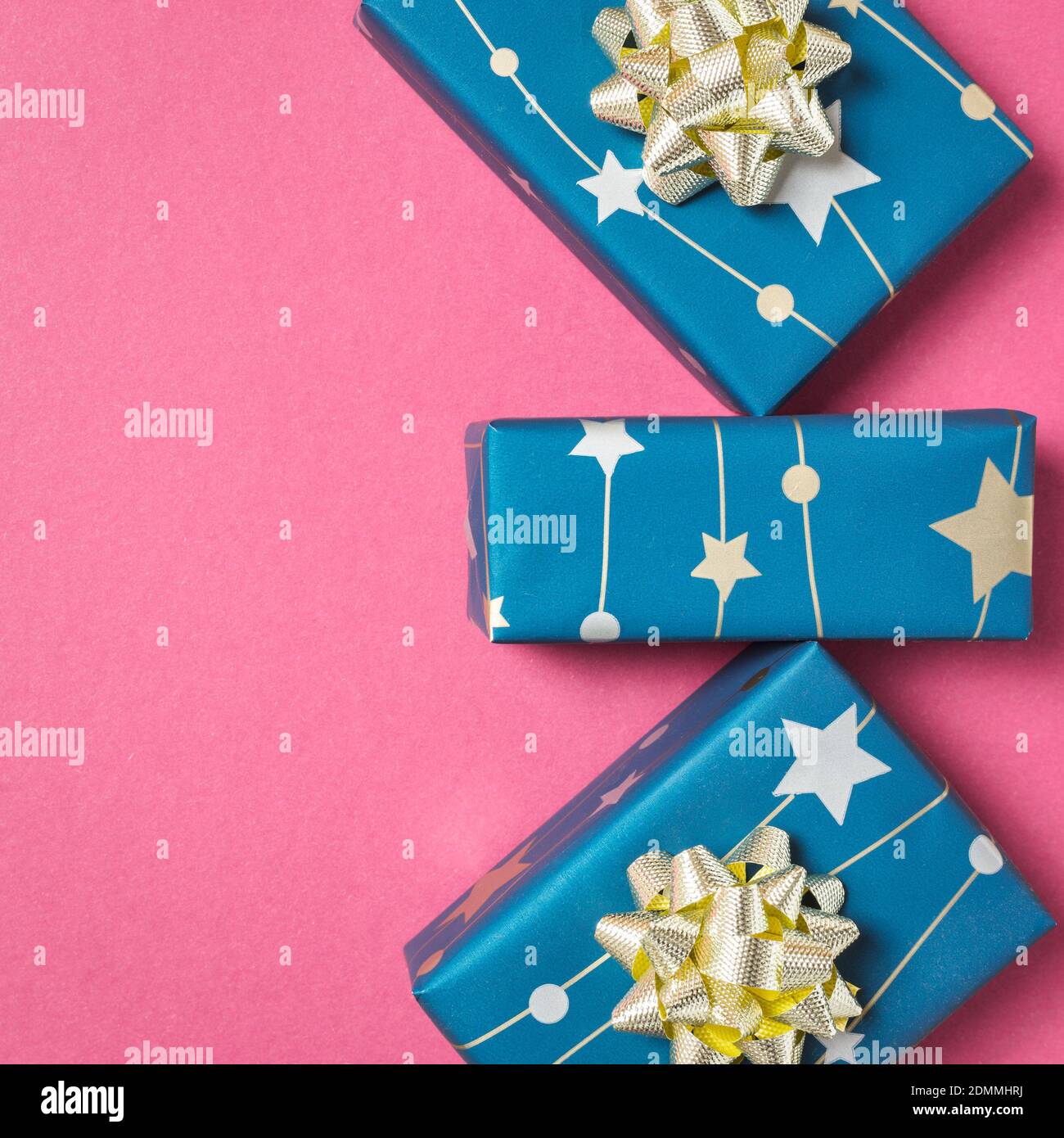 Gift boxes on pastel pink background, top view with copy space. Flat ...