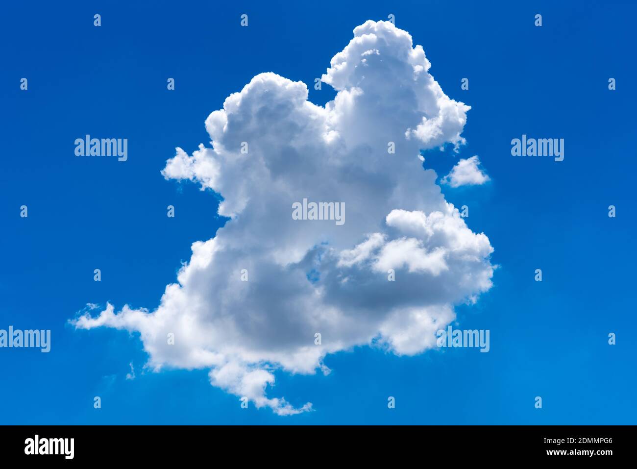 Beautiful cloudscape of nature single white cloud on blue sky background in daytime Stock Photo