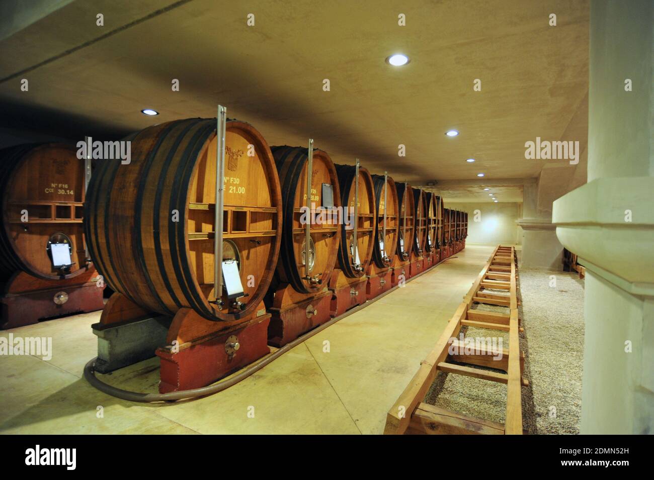 Ampuis on 2013/02/05. Barrels in the cellars of the wine estate Domaine Vidal-Fleury Stock Photo