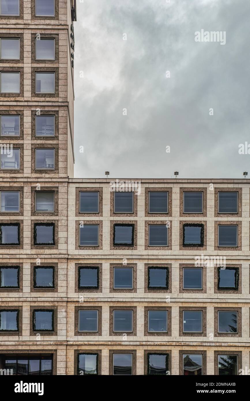 Rathaus Stuttgart modern facade with square windows pattern in Marktplatz. The City Hall (Clock Tower) is a German political and governmental landmark Stock Photo