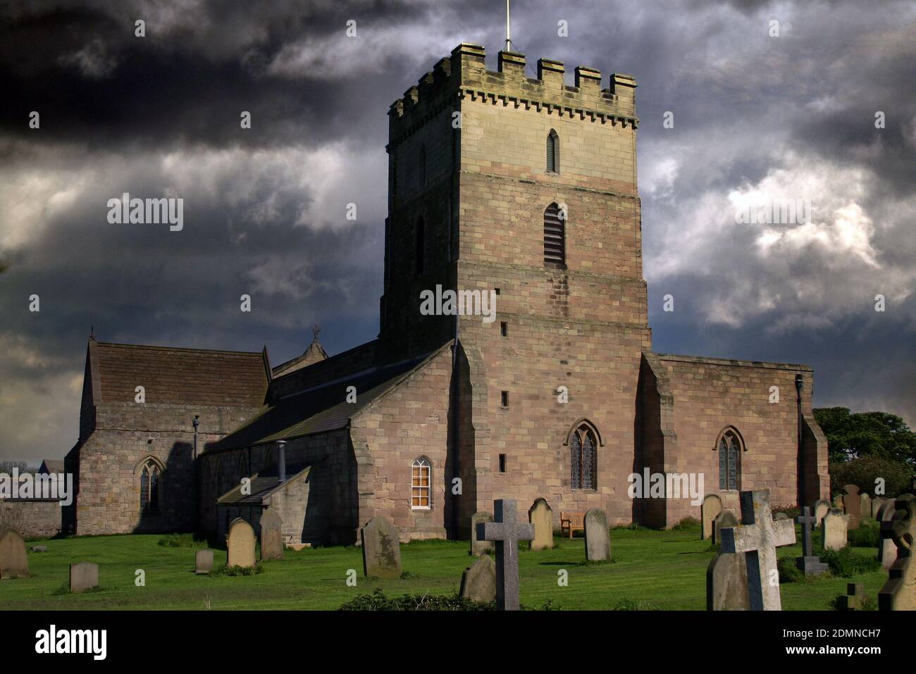 St Aidan’s Church, Bamburgh is a Grade I listed Church of England building in the Diocese of Newcastle. Stock Photo