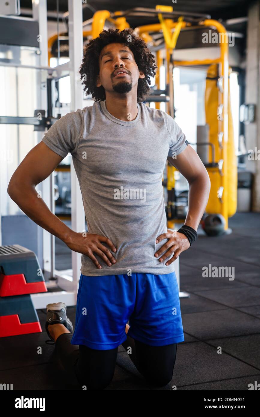 Fitness man tired relaxed after workout exercise Stock Photo Alamy