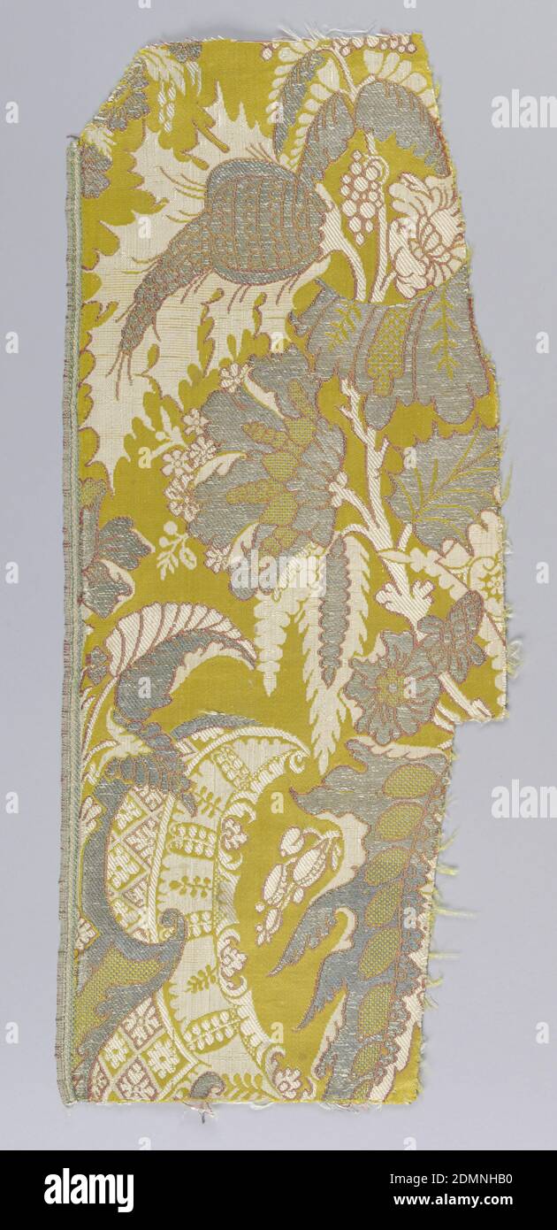 Fragments, Medium: silk, metallic thread Technique: compound satin with supplementary weft, Brilliant yellow satin ground with a profuse symmetrical design of silver, rose and ivory blossoms and serrated leaves in vases., France, ca. 1700, woven textiles, Fragments Stock Photo