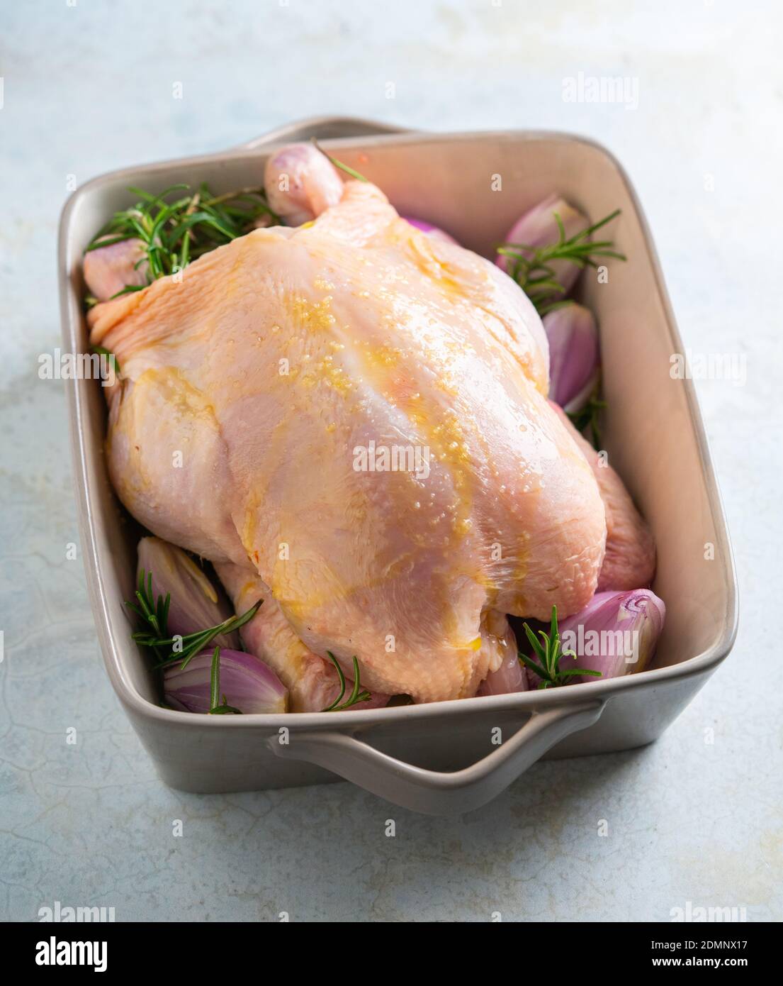 Raw whole chicken fresh herbs hi-res stock photography and images - Alamy