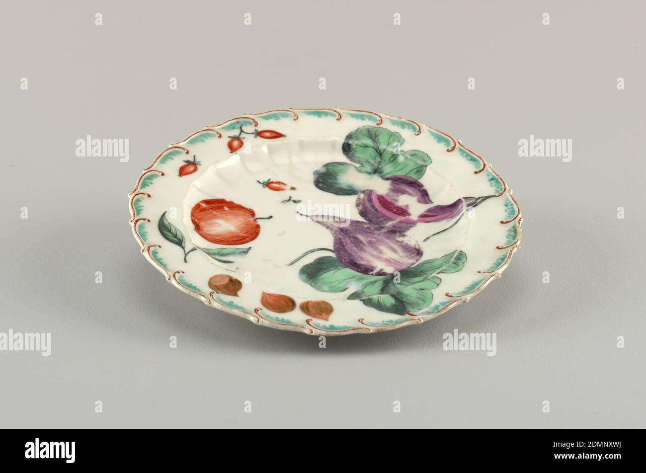 Fruit Plate, Chelsea Porcelain Manufactory, English, established ca. 1743/45, soft paste porcelain, vitreous enamel, Flat marly springing from scalloped inner rim. Raised, feathered edge, painted brown and green. In center, large and small cucumber and an apple. On marly, three rose hips, a purple long radish, currents and small red berries., England, 1753–1758, ceramics, Decorative Arts, plate, plate Stock Photo