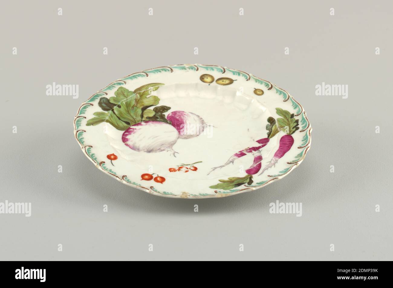 Fruit Plate, Chelsea Porcelain Manufactory, English, established ca. 1743/45, soft paste porcelain, vitreous enamel, Scalloped circular form with brown and aqua foliate scroll. Foliage includes a radish, a peach, red and black currants, cucumbers and vines., England, 1753–1756, ceramics, Decorative Arts, plate, plate Stock Photo