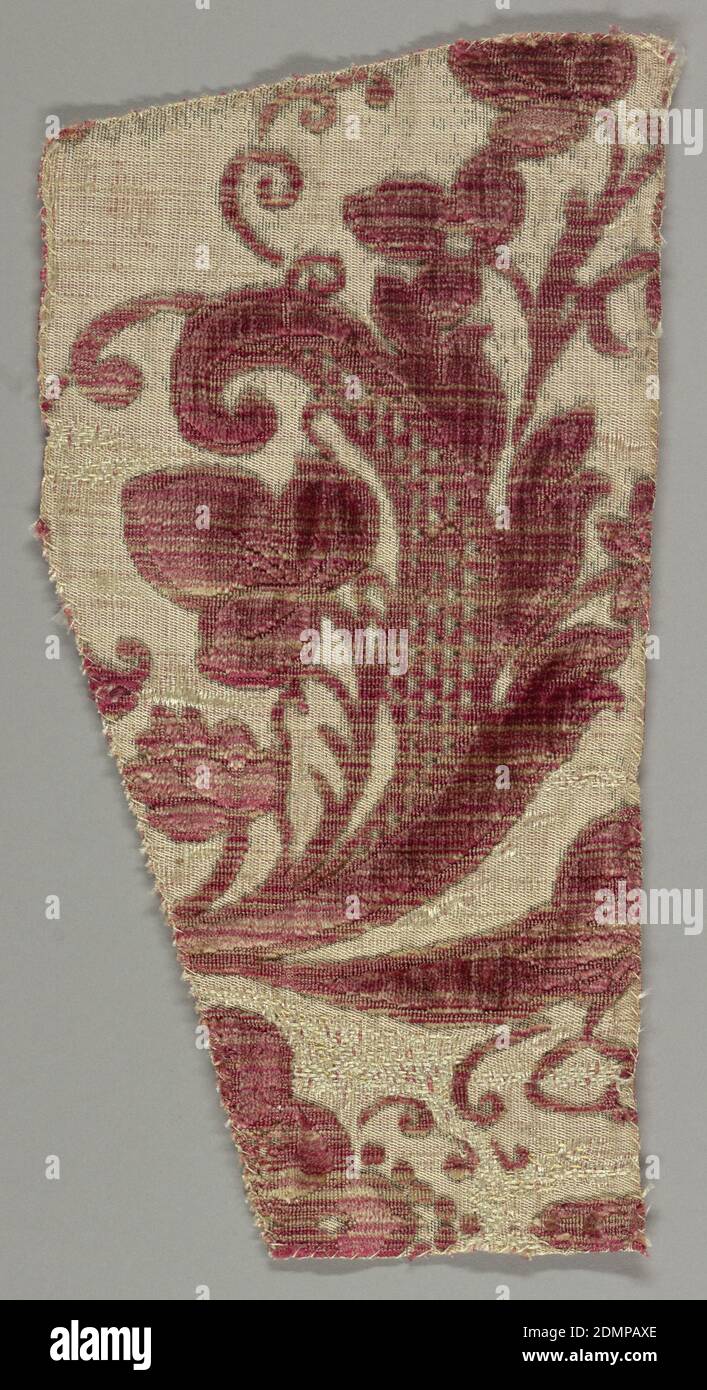 Fragment, Medium: silk, metallic Technique: velvet with cut and uncut pile, Fragment of a larger pattern showing a floral spray with infilling of triangles in rose. Traces of silver metallic., 17th–18th century, woven textiles, Fragment Stock Photo