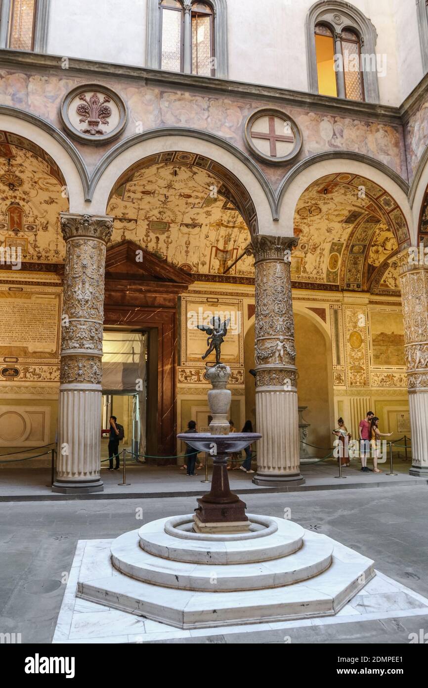Nice view of the first courtyard in the Palazzo Vecchio with a fountain by Battista del Tadda in the centre. A porphyry column holds a marble tub and... Stock Photo