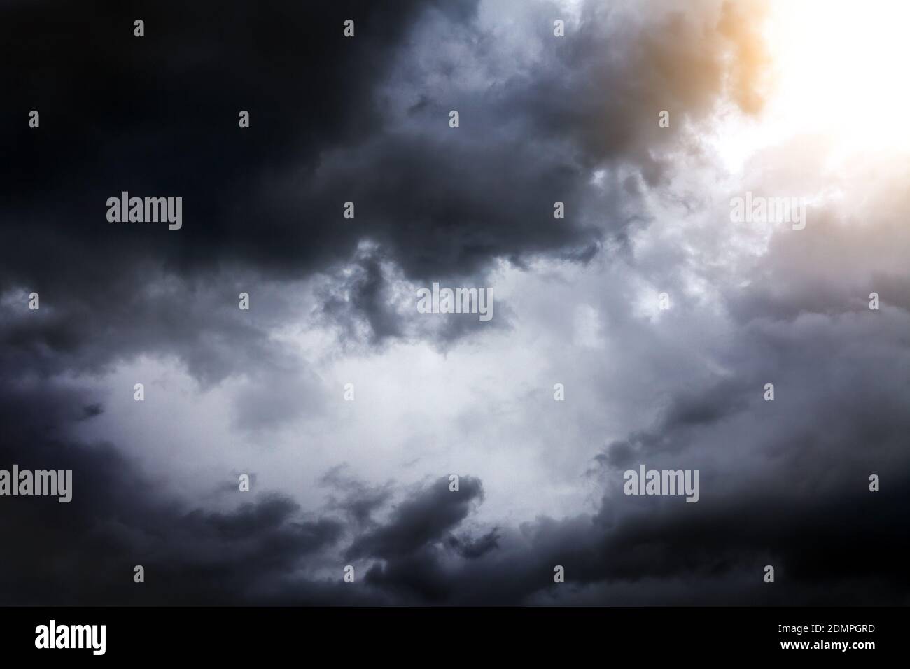 Light in the Dark and Dramatic Storm Clouds Stock Photo - Alamy