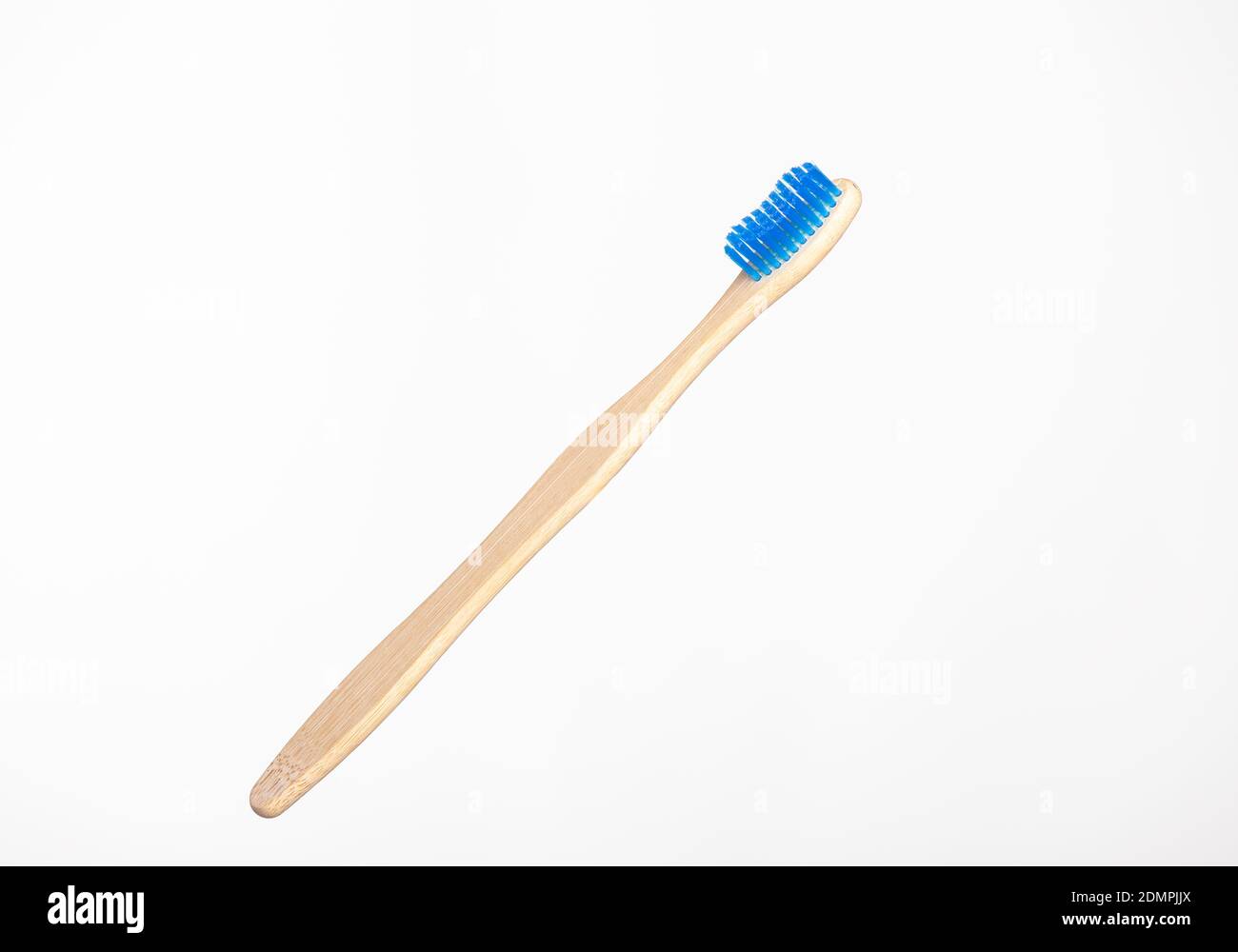 Bamboo Toothbrush On A white Background Stock Photo