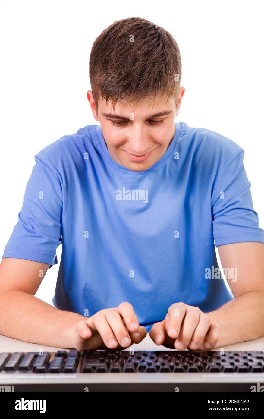 Young Man with a Computer Keyboard on the White Background Stock Photo ...
