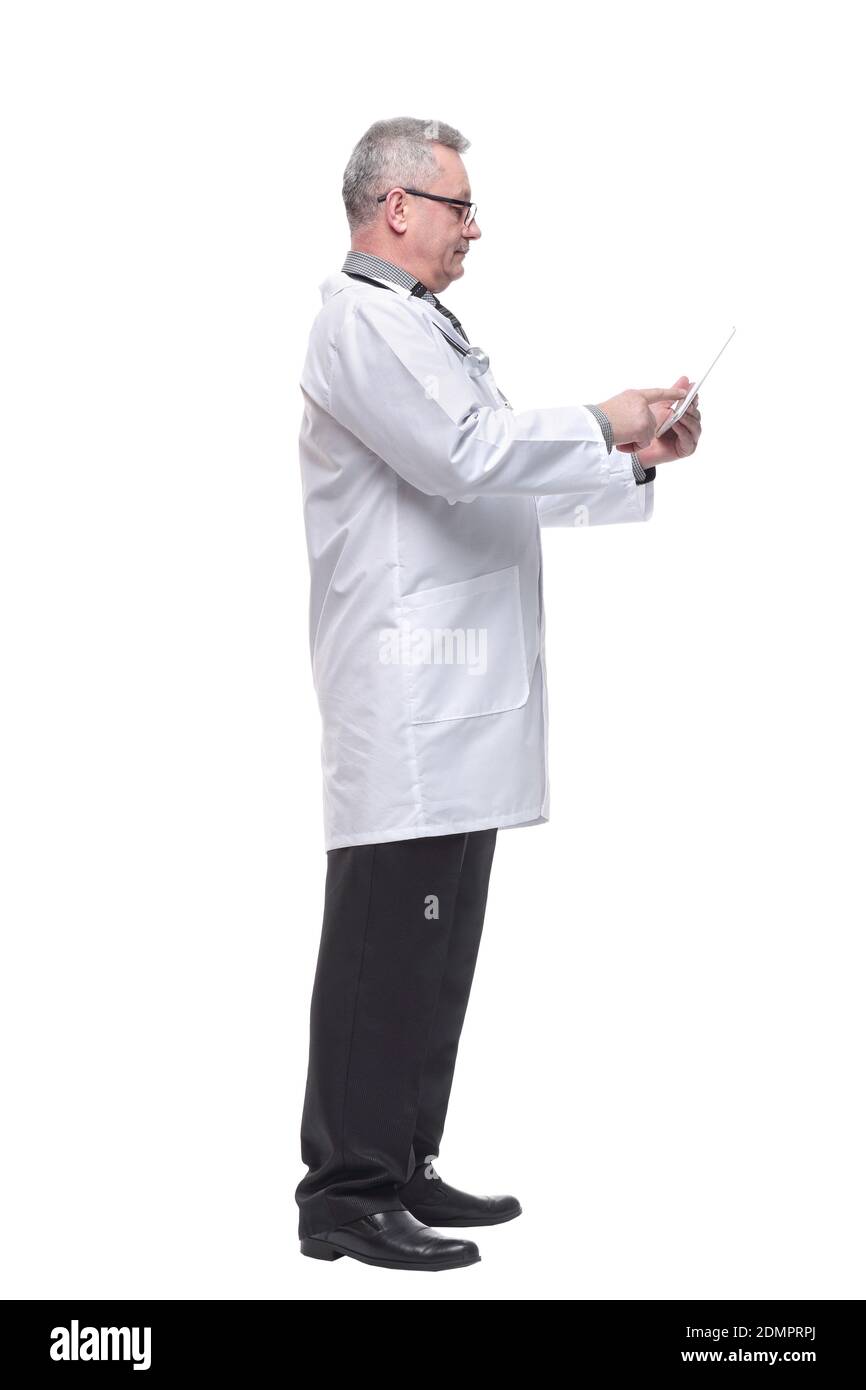 Full length portrait of male doctor using digital tablet isolated on white Stock Photo
