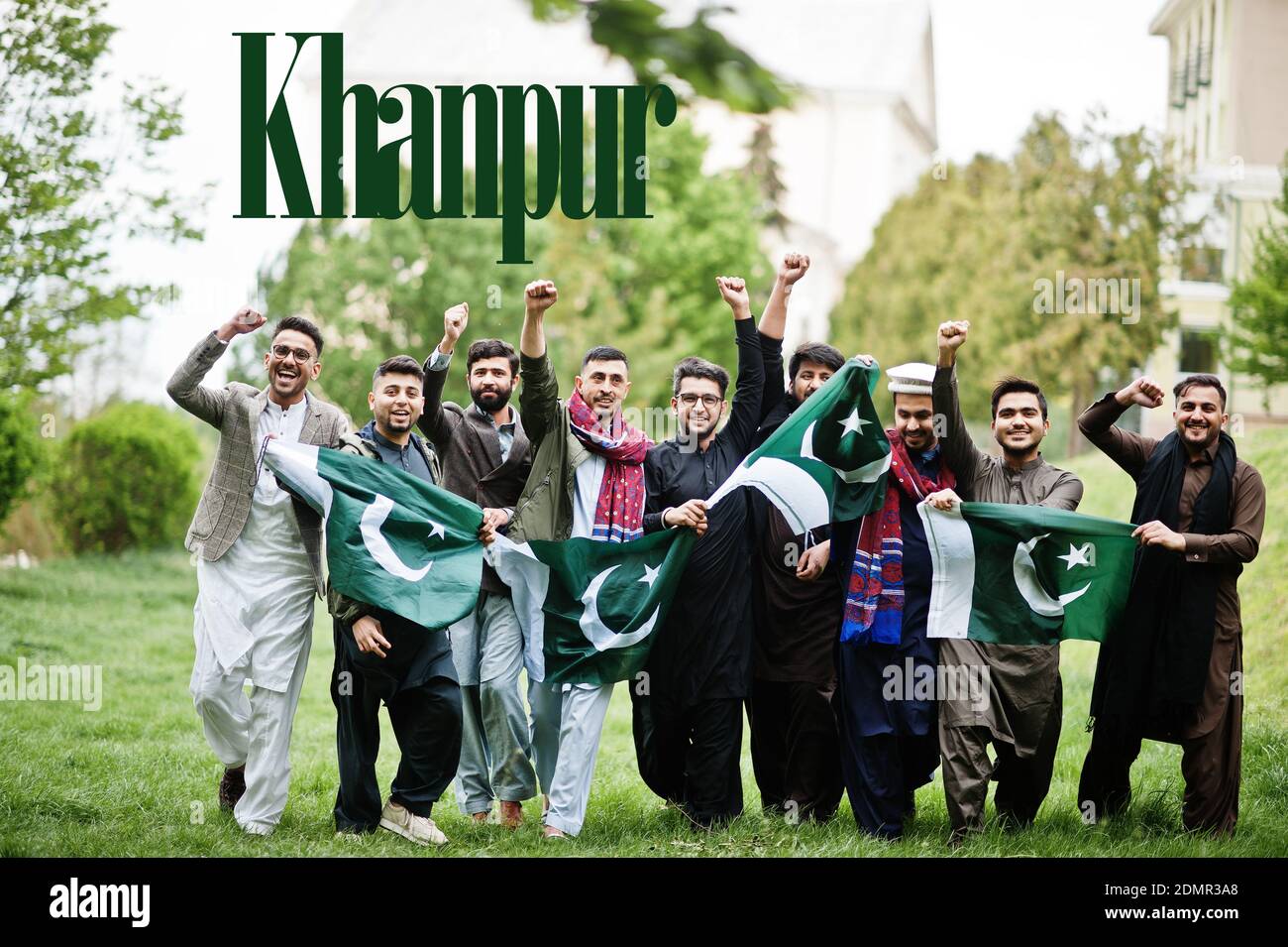 Khanpur city. Group of pakistani man wearing traditional clothes with national flags. Biggest cities of Pakistan concept. Stock Photo