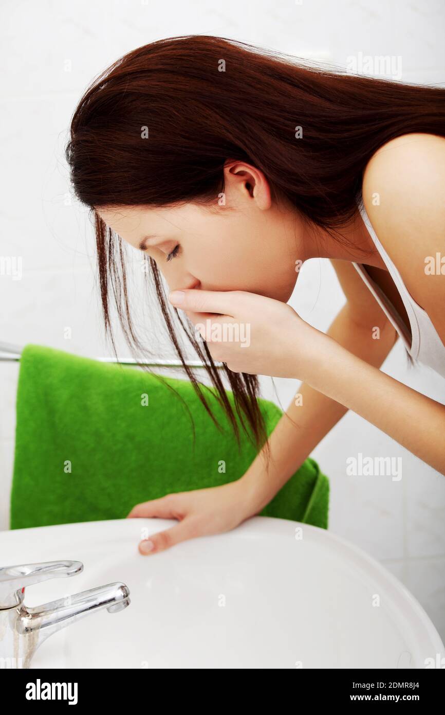 Woman Washing Face In Sink Stock Photo Alamy