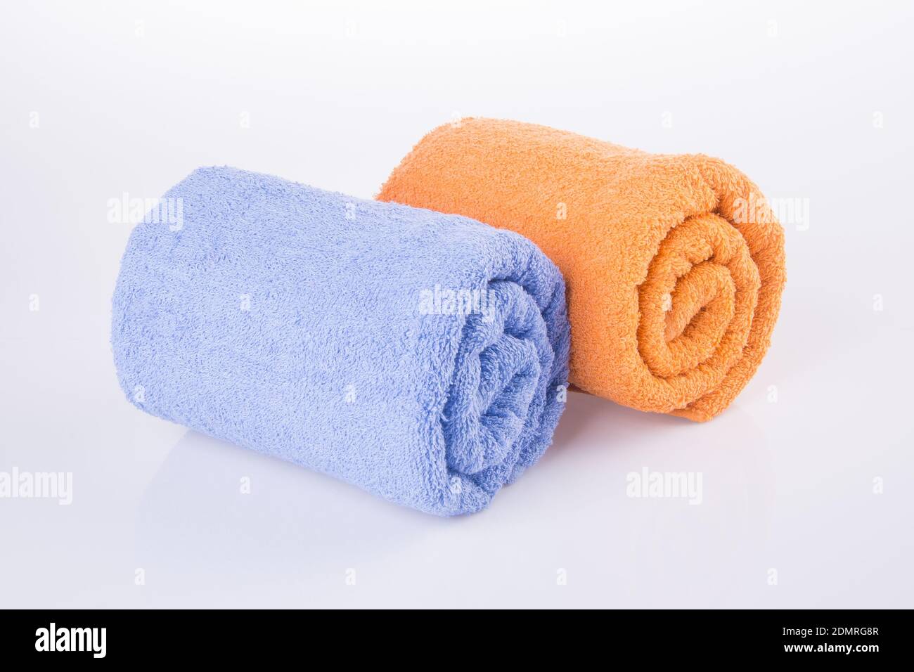Download Rolled Up Orange Towel On A Sun Lounger Background Of Pool In Resort Or Hotel Stock Photo Alamy
