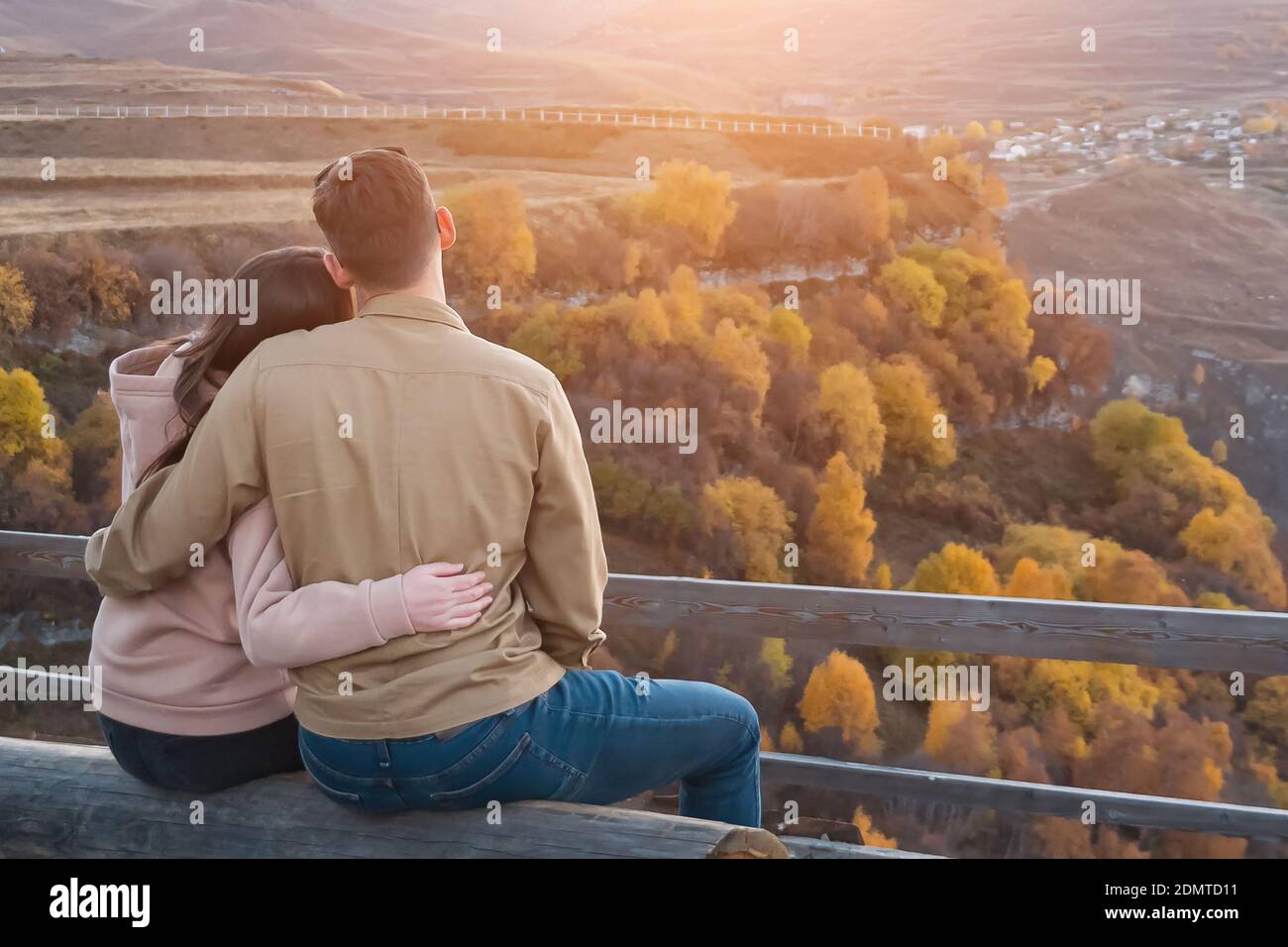 Backside man sitting on bench hi-res stock photography and images - Alamy