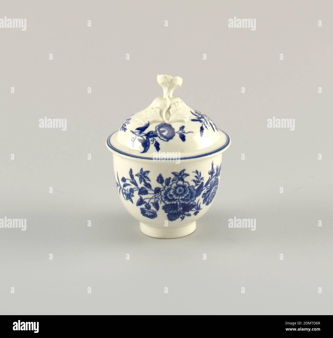 Sugar Bowl, Royal Worcester, English, established 1751, soft paste  porcelain, vitreous enamel, Elongated hemisphere, on cylindrical foot.  Double-domed cover with applied knob of flower in the round attached to a  stem and