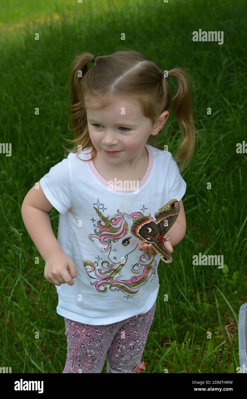 Beautiful, Both Girl And Moth Stock Photo - Alamy
